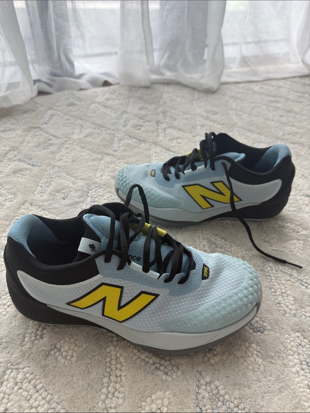 New Balance Womens Light Blue Sneakers with Yellow 'N' Accent